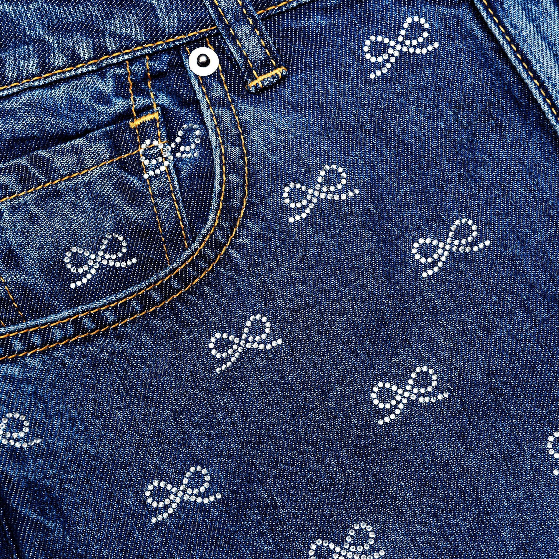 A close up of the fabric for the Lightweight Bow Embellished Jeans