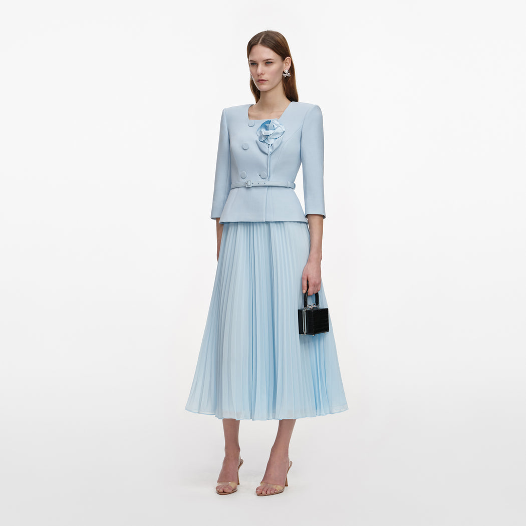 Side view of a woman wearing the Blue 3D Flower Chiffon Midi Dress