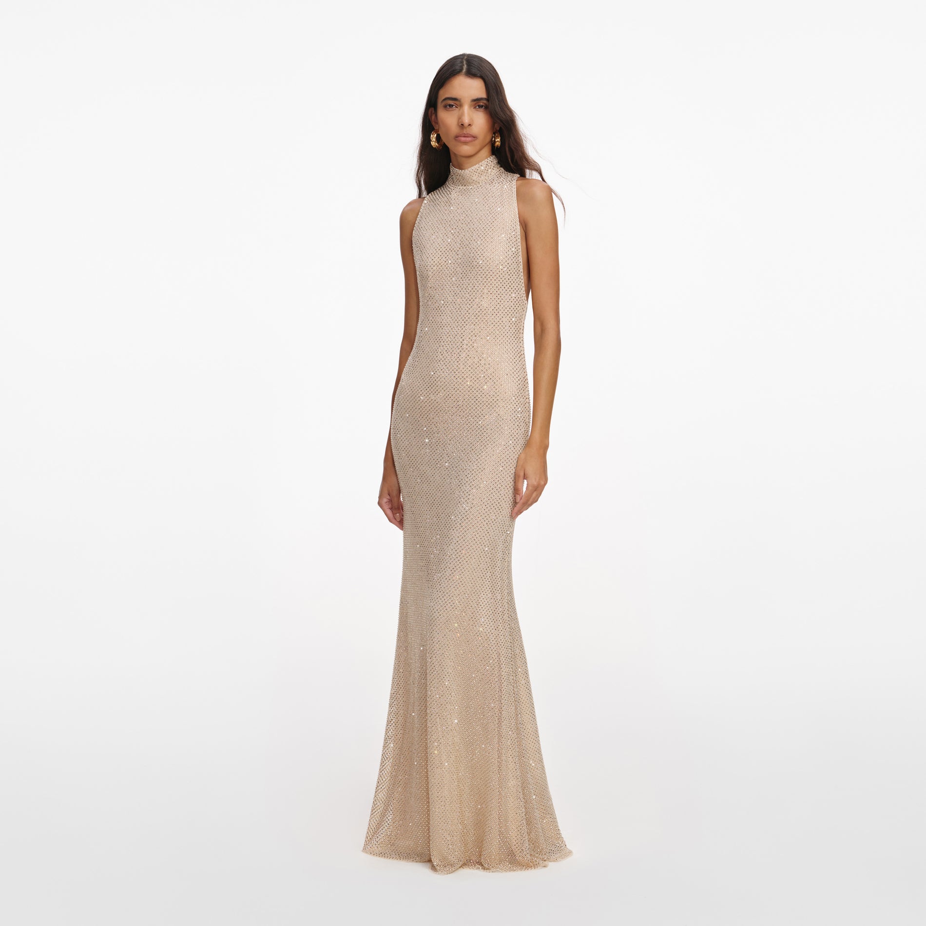 Side view of a woman wearing the Champagne Rhinestone Racer Back Maxi Dress