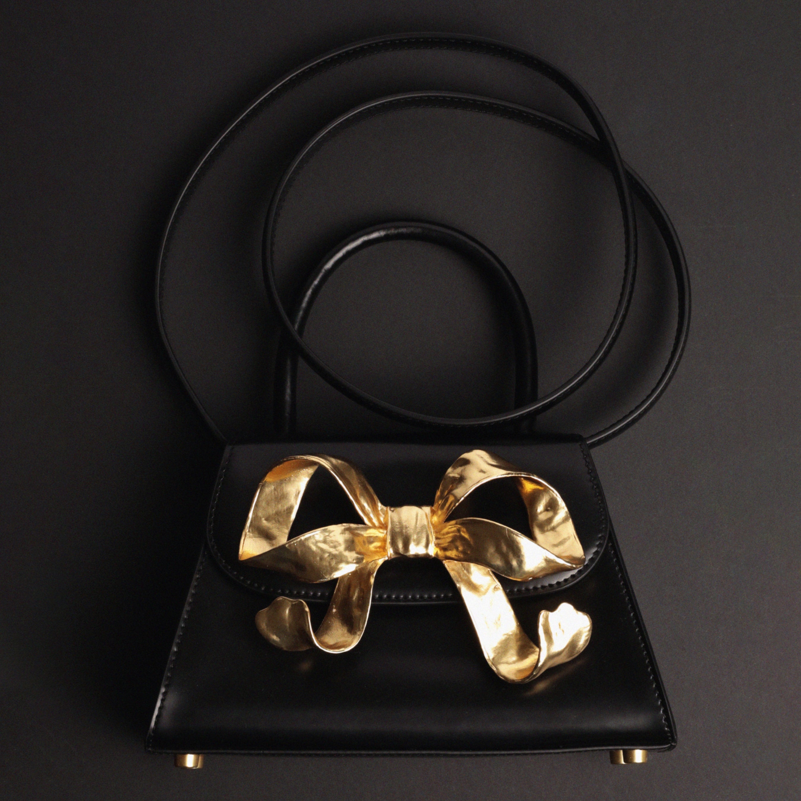 The Bow Mini in Black with Gold Hardware