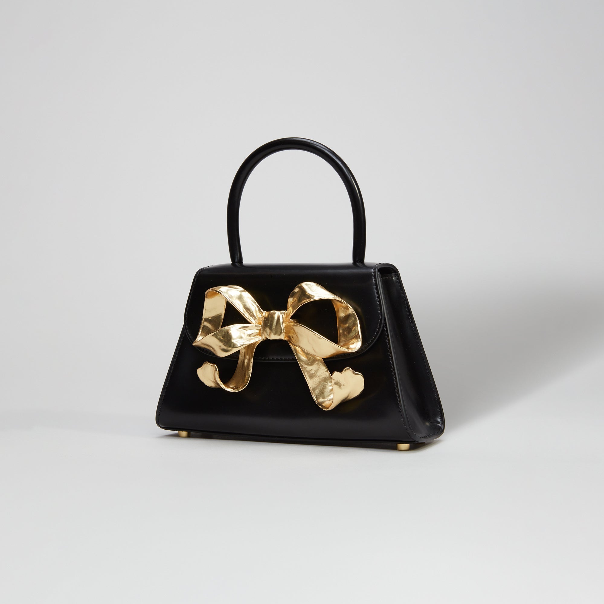 The Bow Mini in Black with Gold Hardware