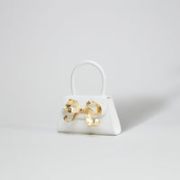 The Bow Micro in White with Gold Hardware