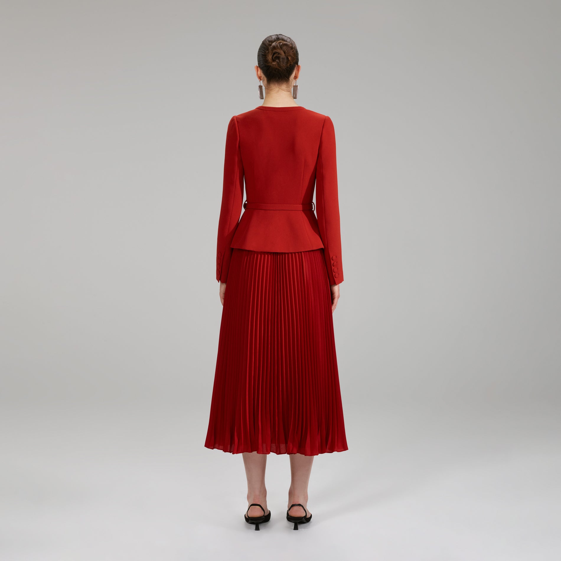 A woman wearing the Red Midi Heavy Crepe Dress