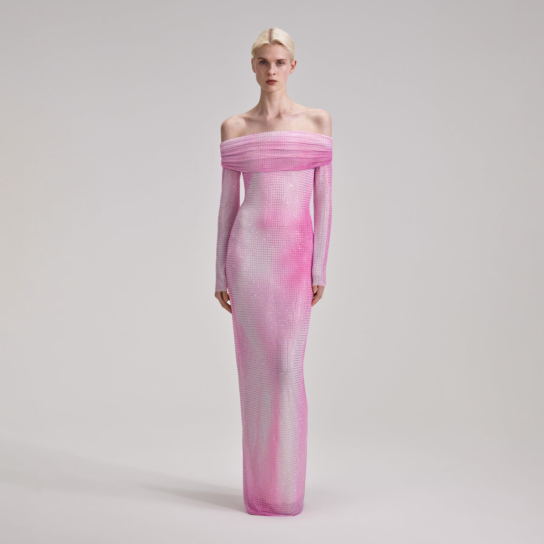 A woman wearing the Pink Contour Print Maxi Dress