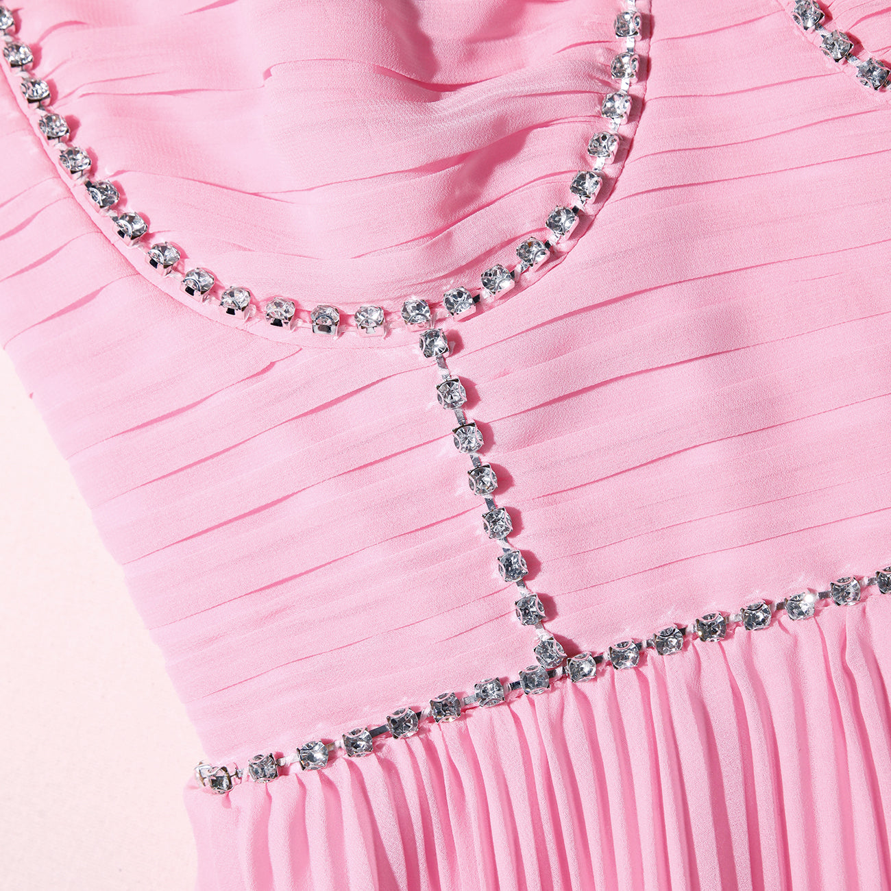A close up of the fabric for the Pink Chiffon Tiered Midi Dress