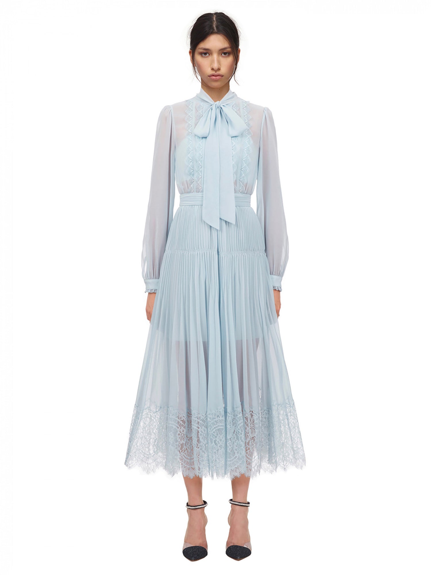 A woman wearing the Pale Blue Chiffon Trimmed Dress